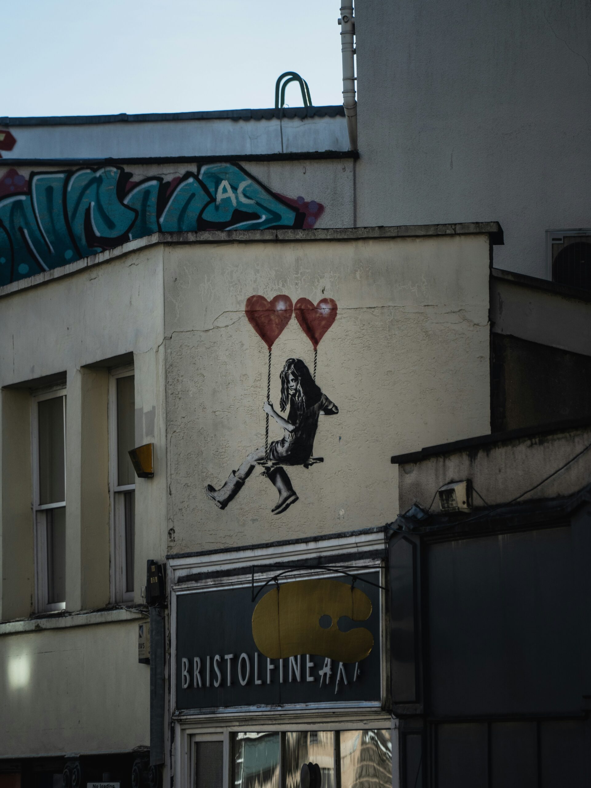 One of many Banksy's graffitis by <a href="https://unsplash.com/@winstontjia?utm_content=creditCopyText